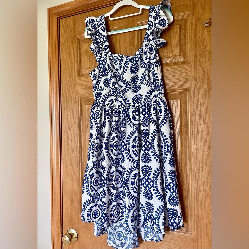 New, never worn! Royal blue & white print dress w/open tie back. Size XL (12/14)